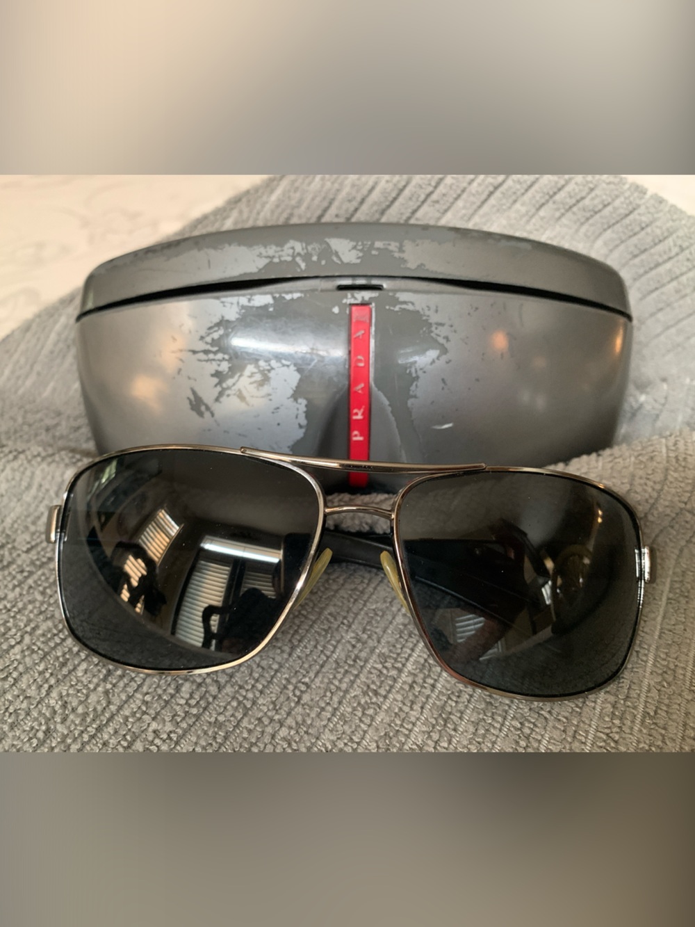 Prada Gray Sunglasses with Black Lenses